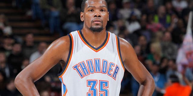 SACRAMENTO, CA - DECEMBER 16: Kevin Durant #35 of the Oklahoma City Thunder looks on during the game against the Sacramento Kings on December 16, 2014 at Sleep Train Arena in Sacramento, California. NOTE TO USER: User expressly acknowledges and agrees that, by downloading and or using this photograph, User is consenting to the terms and conditions of the Getty Images Agreement. Mandatory Copyright Notice: Copyright 2014 NBAE (Photo by Rocky Widner/NBAE via Getty Images)