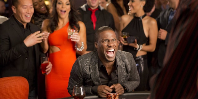 Kevin Hart, center, as Cedric in a scene from "Think Like A Man Too."