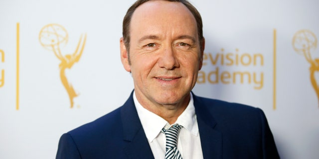 Actor Kevin Spacey, outstanding lead actor in a drama series nominee for "House of Cards," poses at the Television Academy's Performers Peer Group cocktail reception to celebrate the 66th Primetime Emmy Awards in Beverly Hills, California July 28, 2014. REUTERS/Danny Moloshok (UNITED STATES - Tags: ENTERTAINMENT) - RTR40GMW