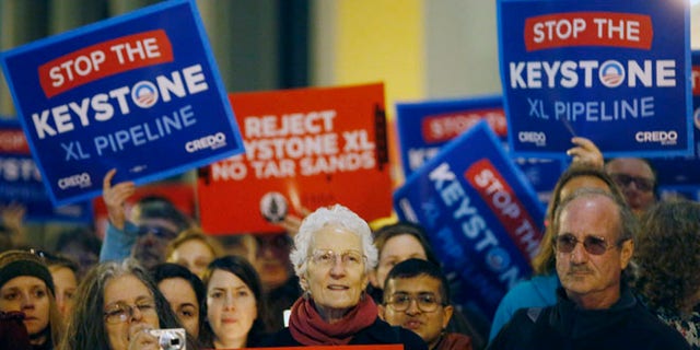 Feb 3, 2014: Demonstrators protest against the proposed Keystone XL oil pipeline in San Francisco, California. (Reuters)