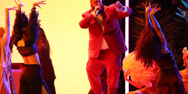 Khaled performs his hit single, "Wild Thoughts" with singer Rihanna on the Grammys' stage.