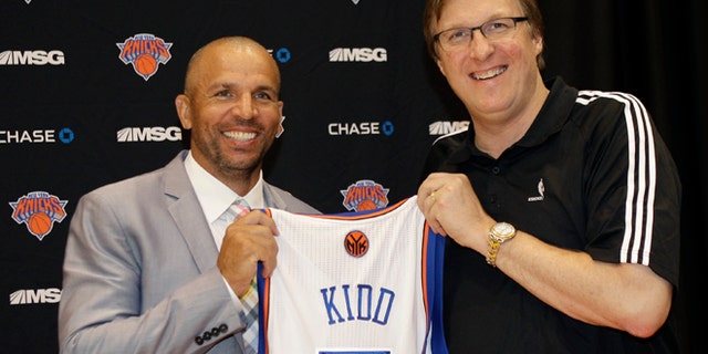 July 12, 2012: New York Knicks executive vice president and general manager Glen Grunwald poses for a photograph with Jason Kidd, one of the Knicks two newest additions, following a news conference at the team's training facility in Tarrytown, N.Y., Thursday, July 12, 2012.