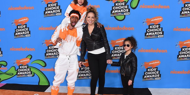Nick Cannon, center left, Mariah Carey, center right, and from left, their children Moroccan and Monroe arrive at the Kids' Choice Awards at The Forum on Saturday, March 24, 2018, in Inglewood, Calif. (Photo by Jordan Strauss/Invision/AP)