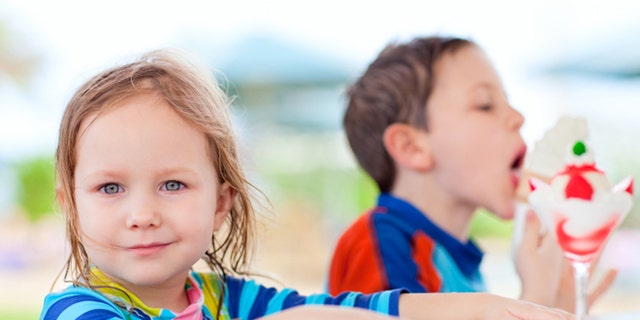 Set up a sprinkler or baby pool for the kids to cool off in — or set up a bubble station and play some upbeat music. You don't need to spend a fortune for the kids to have fun.