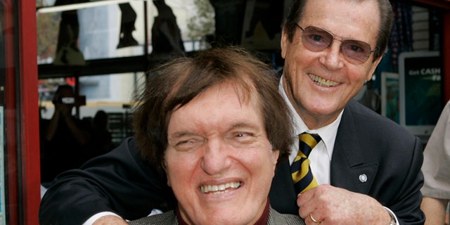 Oct. 11, 2007: Actor Roger Moore, right, who played the part of James Bond in seven films, poses with actor Richard Kiel, who played the role of Jaws in "The Spy Who Loved Me," during a ceremony honoring Moore with a star on the Hollywood Walk of Fame in Los Angeles.