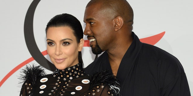 June 1, 2015. Kim Kardashian, left, and Kanye West arrive at the 2015 CFDA Fashion Awards at Alice Tully Hall, Lincoln Center, in New York.