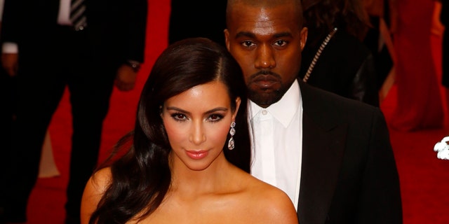 May 5, 2014. Kim Kardashian and Kanye West arrive at the Metropolitan Museum of Art Costume Institute Gala Benefit in New York.