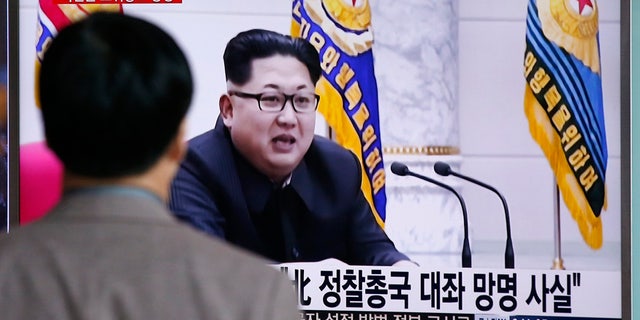 April 11, 2016: A man watches a TV news program showing file footage of North Korean leader Kim Jong Un at Seoul Railway Station in Seoul, South Korea
