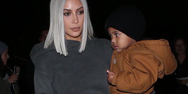 Kim Kardashian takes her son Saint West ice skaing in Los Angeles on Dec. 23, 2017.