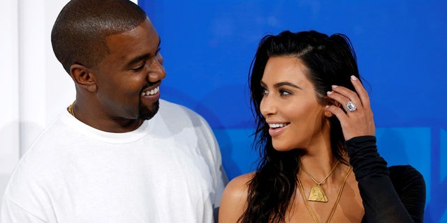 FILE PHOTO - Kim Kardashian and Kanye West arrive at the 2016 MTV Video Music Awards in New York, U.S., August 28, 2016. (REUTERS/Eduardo Munoz)