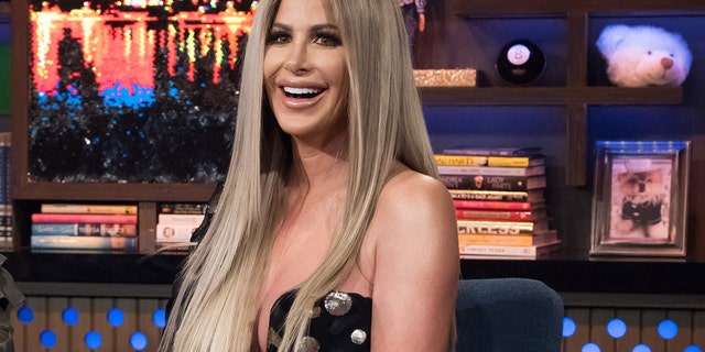 Kim Zolciak gifted her daughter Brielle a rose gold pistol for her 21st birthday.