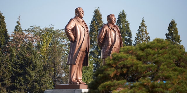 Statues of former leaders Kim Il Sung and Kim Jong Il are seen in Wonsan, North Korea