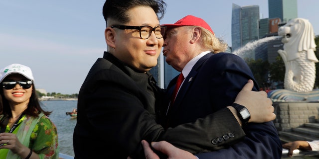 The lookalike, who identified himself as Howard X, said police at Changi Airport told him to stay away from the hotel where the Trump-Kim summit will take place.