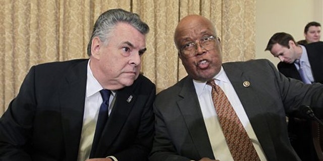 Rep. Peter King, left, chairman of the House Homeland Security Committee, talks to Rep. Bennie Thompson, the top Democrat on the committee, on Capitol Hill March 10.