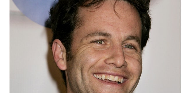 Actor Kirk Cameron, best known for his role as Mike Seaver in the television series 'Growing Pains', poses as he arrives at the launch party for In2TV, the first broadband television network on the Internet, in Beverly Hills, California March 15, 2006. In2TV, available free on AOL.com, will offer thousands of classic television shows such as 'Welcome Back, Kotter,' 'Chico & The Man,' and 'Wonder Woman' as well as interactive features. REUTERS/Fred Prouser - RTR177U7