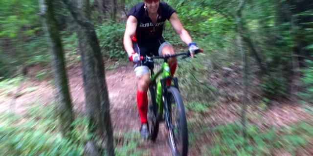 Kirk Smith mountain biking in Athena, Ga.