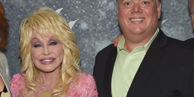 Dolly Parton with former publicist Kirt Webster at the 11th annual ACM Honors on August 23, 2017.