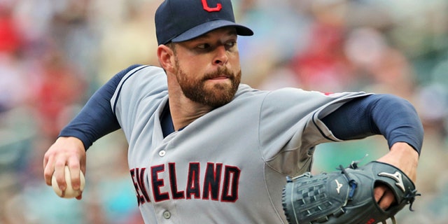 Aug. 21, 2014: Cleveland Indians pitcher Corey Kluber throws against the Minnesota Twins during a baseball game in Minneapolis.