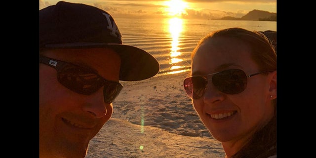 John Knight, left, suffered a severe spinal cord injury after diving into the water on his last day of his honeymoon in Bora Bora with his wife, Alana.