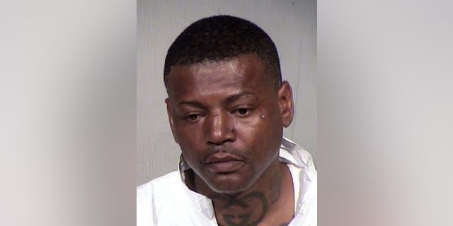 Melvin Harris III was accused of fatally beating a man after the suspect allegedly tried to enter his daughter's locked restroom stall. (Maricopa County Sheriff's Office)