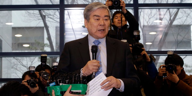Dec. 12, 2014: Korean Air chairman Cho Yang-ho, speaks to the media about an apology at its head office in Seoul, South Korea