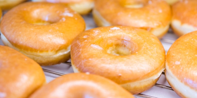 Fresh raised donuts from the local bakery shop.