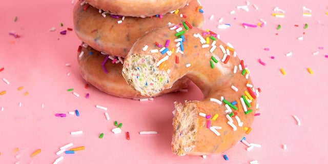 For a limited time, the doughnut chain will offer 12 glazed doughnuts for just $1 with the purchase of any dozen doughnuts.