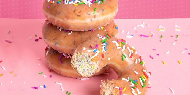 For a limited time, the doughnut chain will offer 12 glazed doughnuts for just $1 with the purchase of any dozen doughnuts.