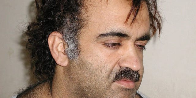 Khalid Sheikh Mohammed is shown in this file photo during his arrest on March 1, 2003. (Reuters Photo)