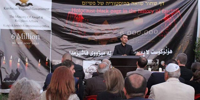 Sherzad Omer Mamsani, who the Kurdish government appointed to reach out to Jews, speaks at the region's first Holocaust remembrance ceremony.