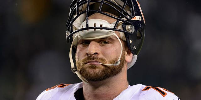 Dec 22, 2013; Philadelphia, PA, USA; Chicago Bears guard Kyle Long (75) along the sidelines prior to playing the Philadelphia Eagles at Lincoln Financial Field. The Eagles defeated the Bears 54-11. Mandatory Credit: Howard Smith-USA TODAY Sports