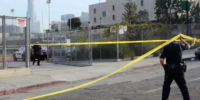 Police tape off the Salvador B. Castro Middle School on Feb. 1.