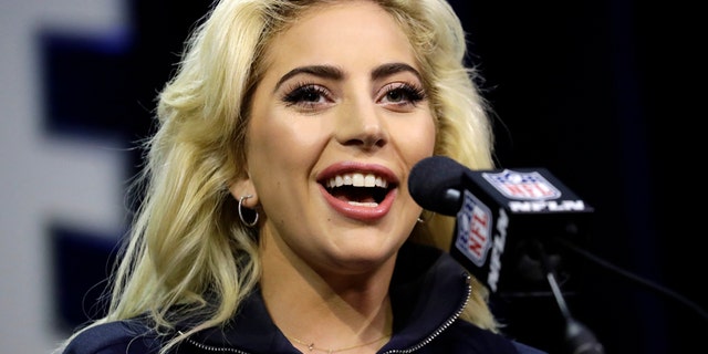 Lady Gaga answers questions at a news conference for the NFL Super Bowl 51 football game Thursday, Feb. 2, 2017, in Houston.