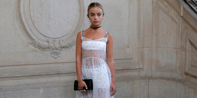 Lady Amelia Windsor poses during a photocall before the Spring/Summer 2018 women's ready-to-wear collection show for fashion house Dior during Paris Fashion Week, France, September 26, 2017.
