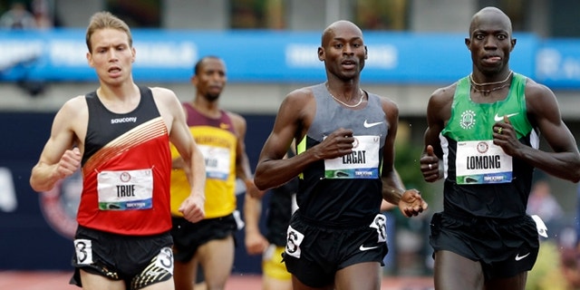 June 25, 2012L Lopez Lomong and Bernard Lagat finish the men's 5000m preliminary at the U.S. Olympic Track and Field Trials in Eugene, Ore.