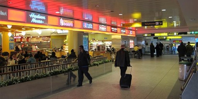 Jan. 10, 2014: Passengers maneuver through one of the cramped hallways at New York's LaGuardia Airport.