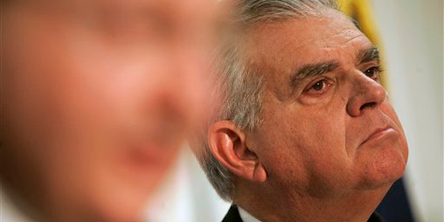 Transportation Secretary Ray LaHood, right, is shown here at a news conference in Allentown, Pa., March 4.