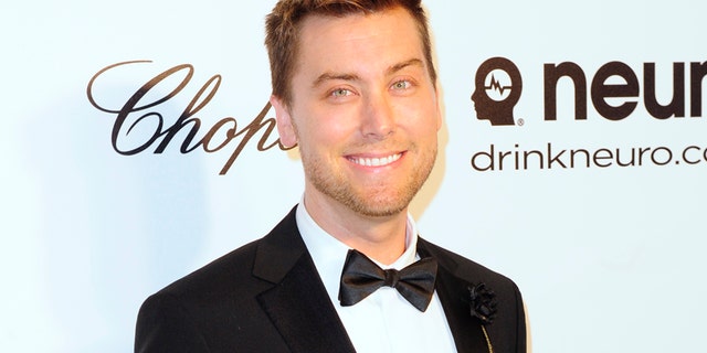 Pop singer Lance Bass arrives at the 2014 Elton John AIDS Foundation Oscar Party in West Hollywood, California March 2, 2014.