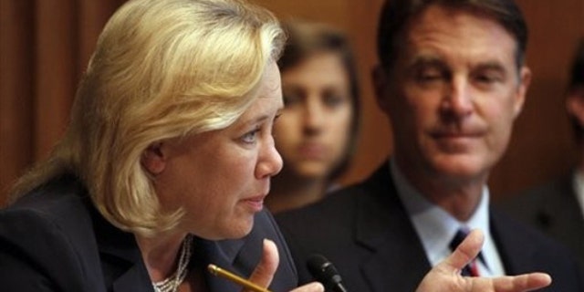 Sen. Mary Landrieu and Sen. Evan Bayh are shown here at an energy committee meeting June 17 on Capitol Hill. (AP Photo)