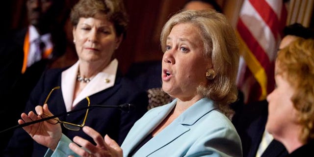 Oct. 3, 2013: Sen. Mary Landrieu, D-La., center, joined by Sen. Jeanne Shaheen, D-N.H., left, Sen. Heidi Heitkamp, D-N.D., right, she speaks during a news conference on Capitol Hill in Washington. (AP)