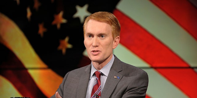 Congressman James Lankford (R) participates in the U.S. Senate debate in Tulsa, Oklahoma, June 18, 2014.  REUTERS/Nick Oxford  (UNITED STATES - Tags: POLITICS) - RTR3UJXM