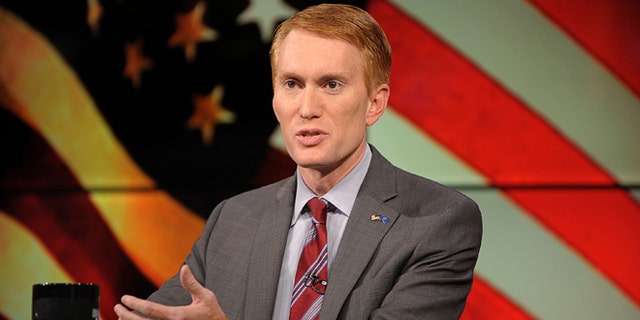 Congressman James Lankford (R) participates in the U.S. Senate debate in Tulsa, Oklahoma, June 18, 2014. REUTERS/Nick Oxford (UNITED STATES - Tags: POLITICS) - RTR3UJXM