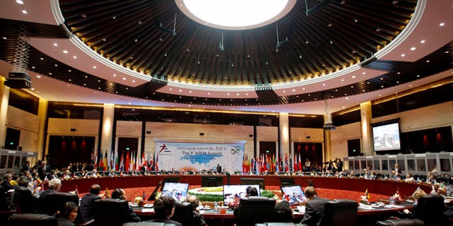 Nov. 6, 2012: European and Asian leaders take part in the closing ceremony for the ASEM Summit in Vientiane, Laos.