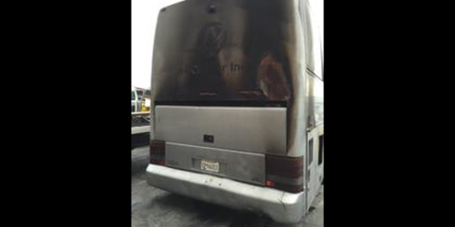 A jammed door trapped 42 people aboard a California bus that had caught fire.