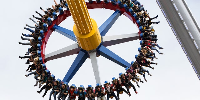 The new ride, which packs 40 riders on a counterclockwise spinning circle, will reach speeds up to 75 miles per hour and heights up to 170 feet.