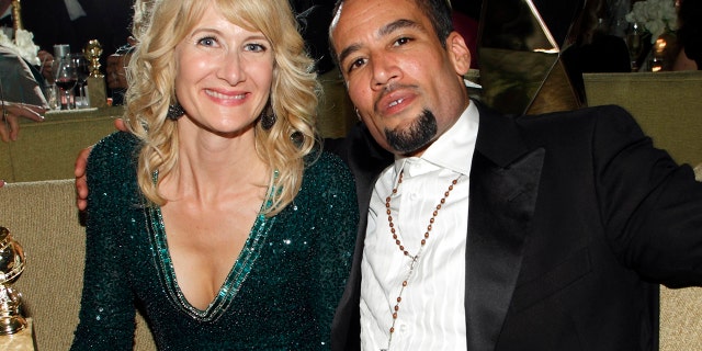 Laura Dern (left) poses with now ex-husband Ben Harper inside the HBO after party after the 69th annual Golden Globe Awards in Beverly Hills, California January 15, 2012.