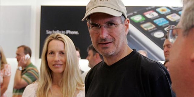 Steve Jobs with wife Laurene Powell Jobs, in 2007.