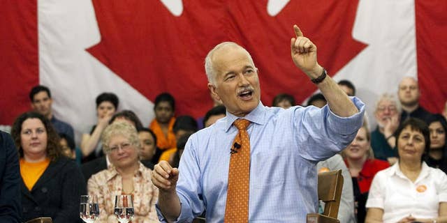 In this April 26, 2011 photo, New Democratic Party Leader Jack Layton fields a question at a town hall. (AP Photo/The Canadian Press, Andrew Vaughan, File)