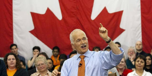 In this April 26, 2011 photo, New Democratic Party Leader Jack Layton fields a question at a town hall. (AP Photo/The Canadian Press, Andrew Vaughan, File)