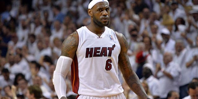 May 26, 2014; Miami, FL, USA; Miami Heat forward LeBron James (6) reacts against the Indiana Pacers in game four of the Eastern Conference Finals of the 2014 NBA Playoffs at American Airlines Arena. The Heat won 102-90. Mandatory Credit: Steve Mitchell-USA TODAY Sports